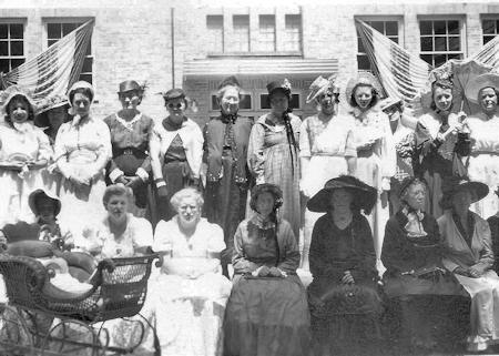 Historical photo showing women wiearing Centennia vintage dresses 